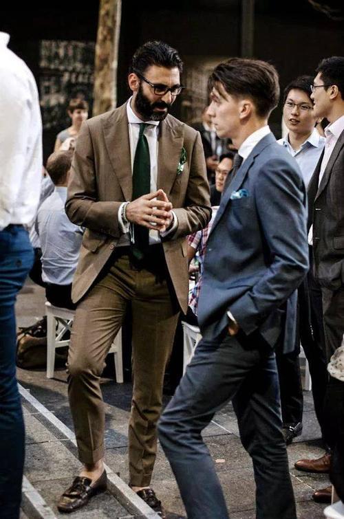 Why are men in suits masculine and attractive?

