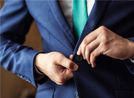What etiquette should I pay attention to when wearing a suit? What's point of wearing a suit to a formal event?
