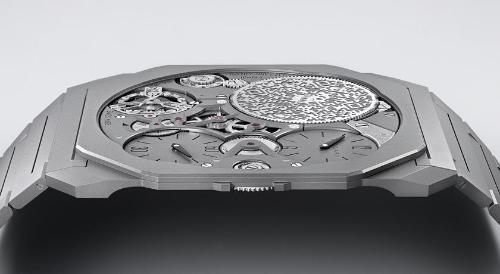 Record-breaking paper-thin mechanical watch! When viewed from side, only thickness of coin is striking.
